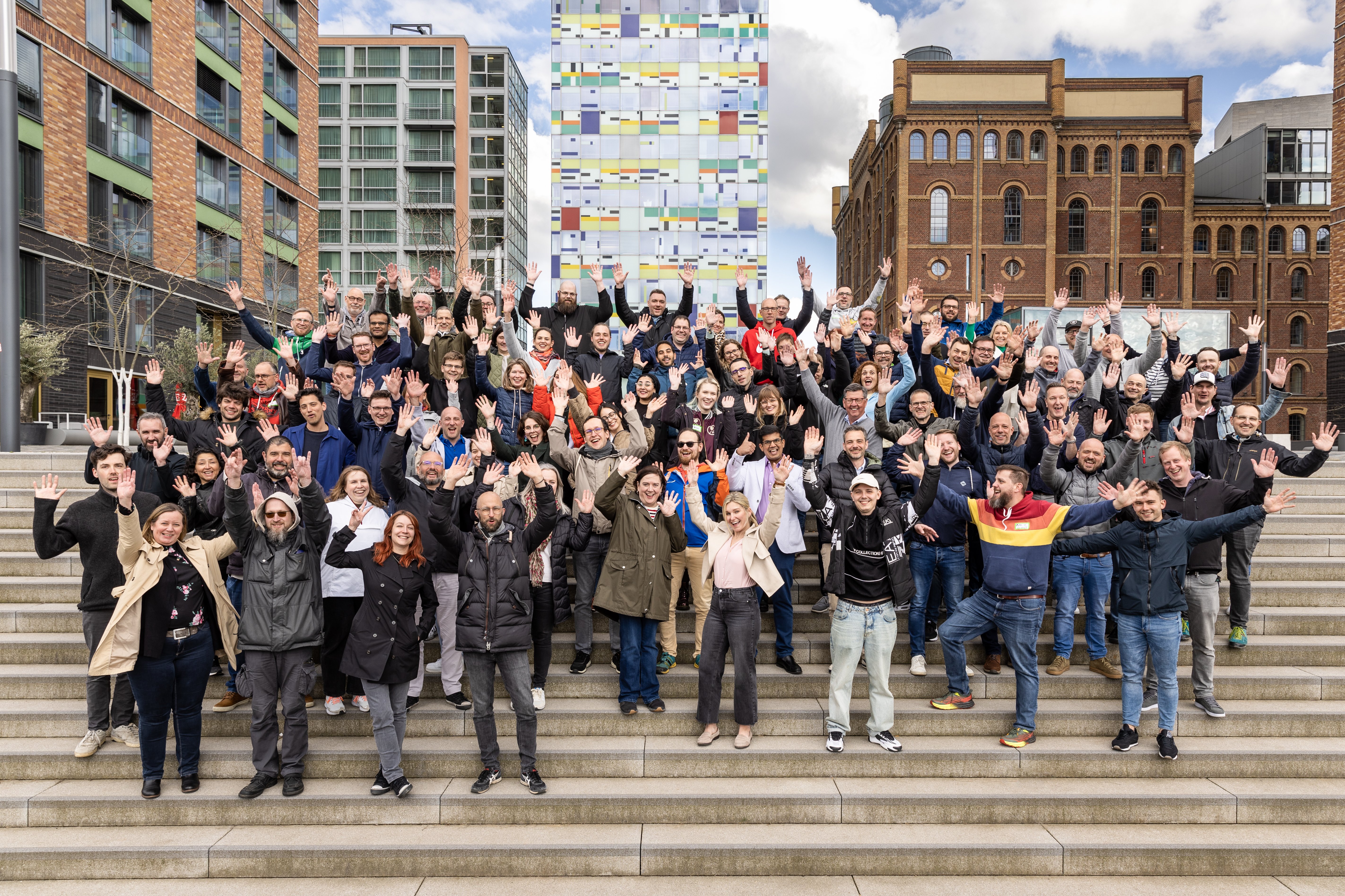 The whole injixo team near their main office at the media harbor in düsseldorf.